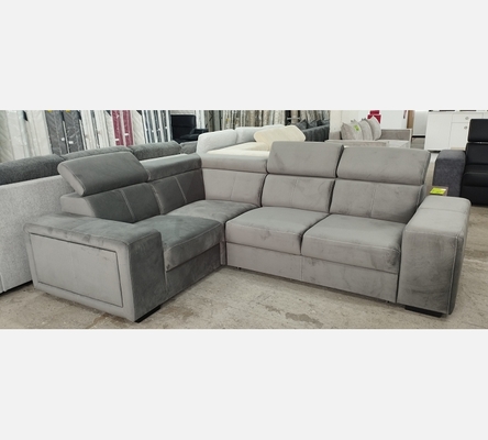 2A2KVG Canapé d'angle Karola convertible en velours gris, têtières amovibles.