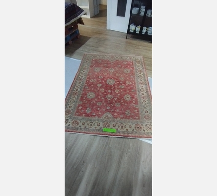 (3) Grand tapis oriental teintes rouge clair. 173/233 cm. Récemment nettoyé