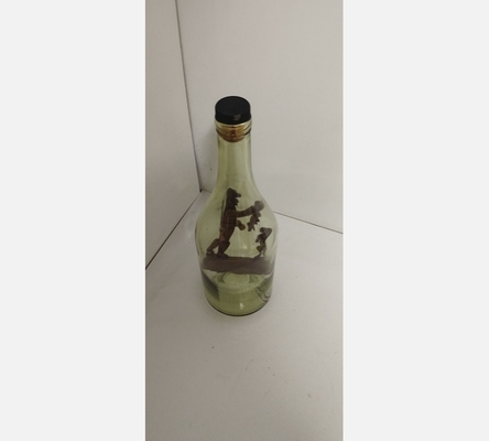 Bouteille avec personnage