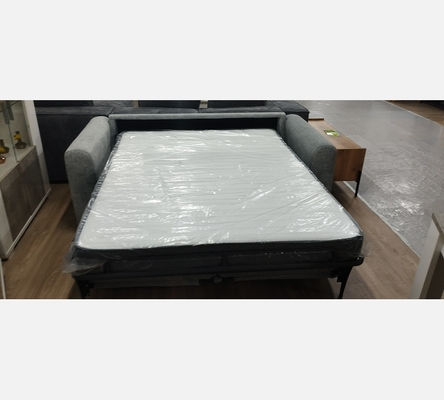 Canapé convertible Amara en tissu gris avec véritable matelas 140/190 cm.