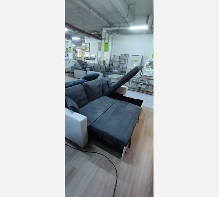 Canapé d'angle en tissu gris et pvc blanc avec coffre et convertible.