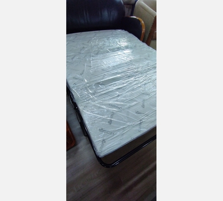 Canapé en cuir convertible avec matelas bultex.