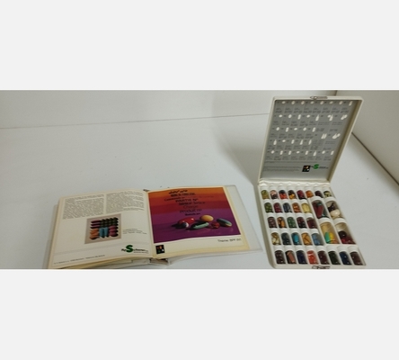 Coffret et fascicule de présentation de capsules vides Scherer