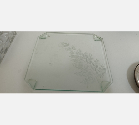 Dessous de plat carré en verre