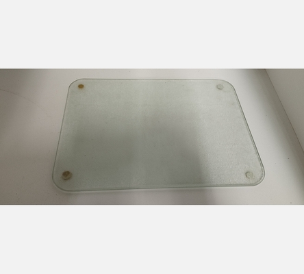 Dessous de plat en verre dépoli.