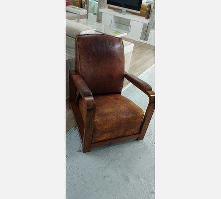 Fauteuil en cuir et bois art déco.