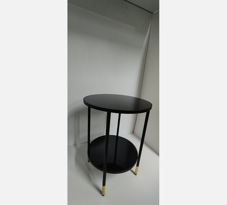 Guéridon rond en métal et verre noir.