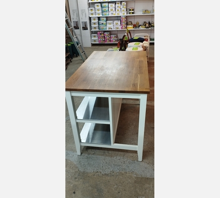 Ilot de cuisine Ikea blanc avec plan de travail en bois massif.