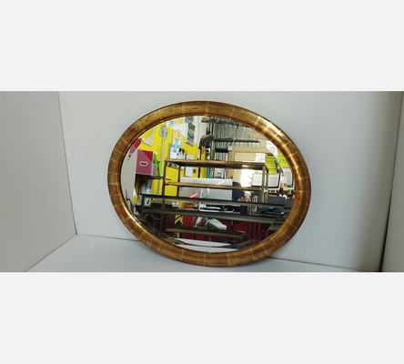 Joli miroir ovale doré et rouge