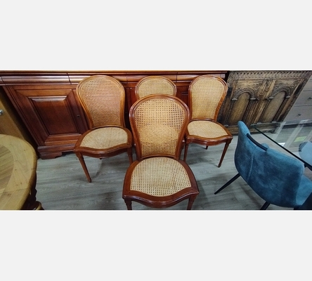 Lot de 4 chaises cannées style Louis Philippe teinte merisier.