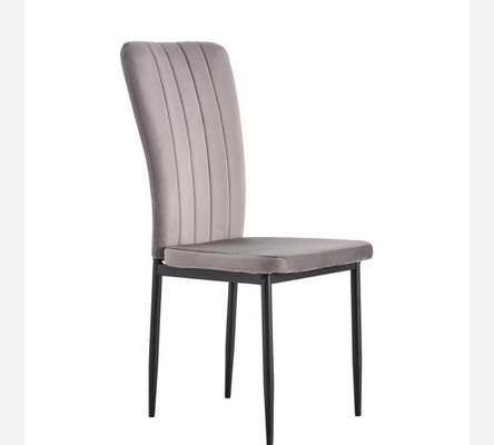 Lot de 4 chaises Pony velours gris et pieds acier noir.