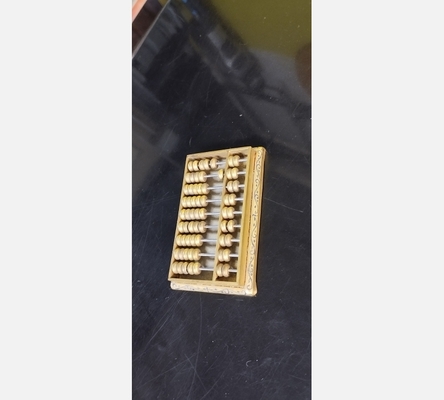 Petit boulier en laiton