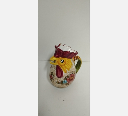 Petit pichet coq en barbotine. 1 éclat
