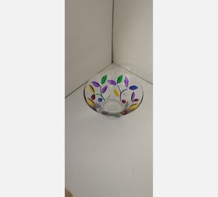 Petite coupelle en verre avec des fleurs de couleurs