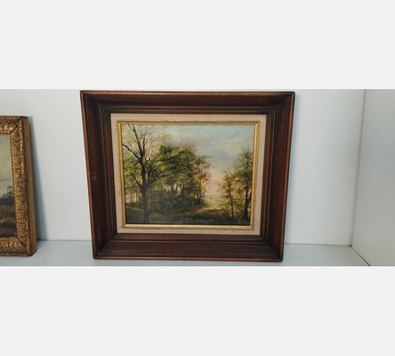 Petite peinture de sous bois signée SL