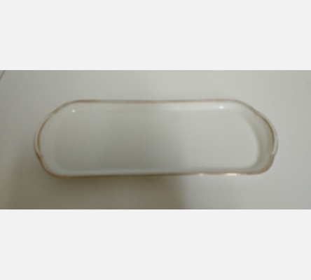Plat oblong contour doré en porcelaine blanche