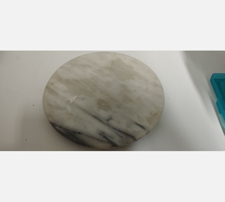 Plateau rond en marbre blanc
