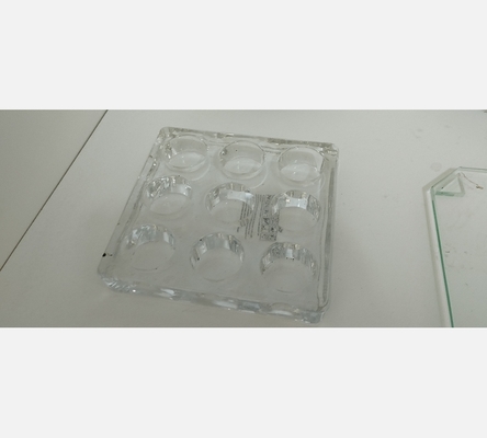 Porte bougies photophore en verre pour 9 bougies.