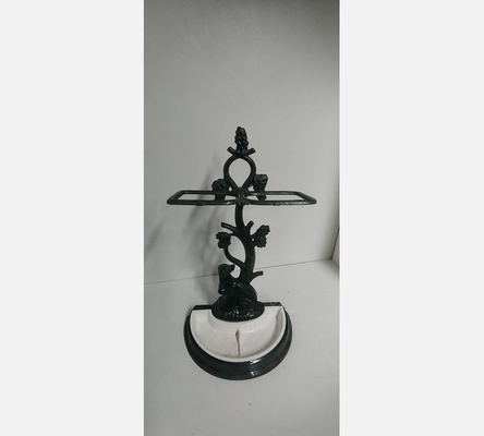 Porte parapluies en fonte .