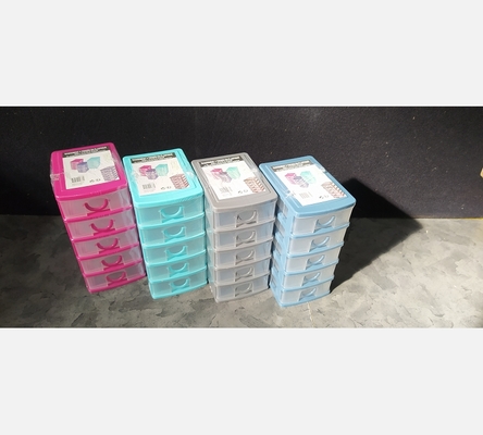 Rangement 5 tiroirs en plastique coloré. L 9 / P 13 / H 19 CM.