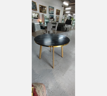 Table à manger ronde effet marbre noir/doré.