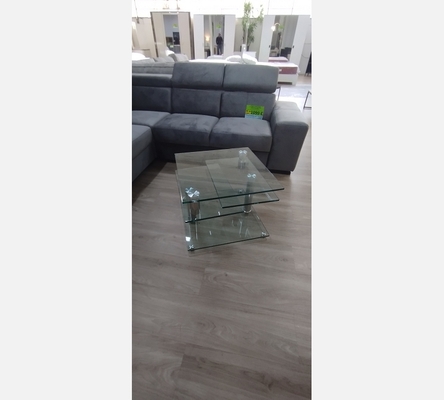 Table basse avec plateaux pivotant en verre.