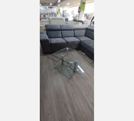 Table basse avec plateaux pivotant en verre.