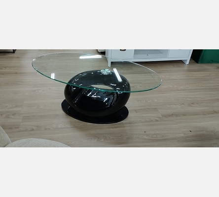 Table basse ovale en verre pied en laque noir.