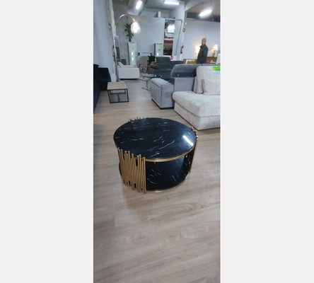 Table basse ronde effet marbre noir/doré.