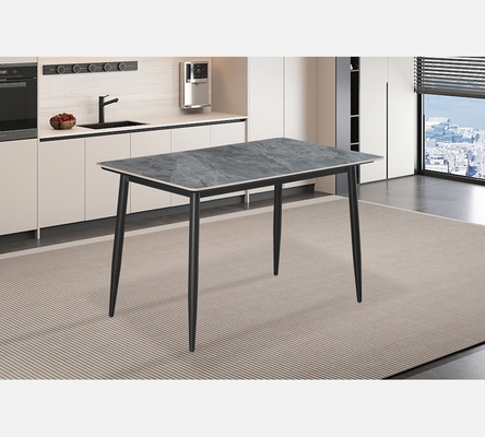 Table de salle à manger Kenzo dessus pierre grise.