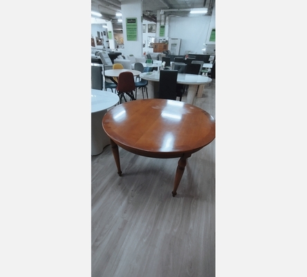 Table ronde en merisier avec 2 allonges.