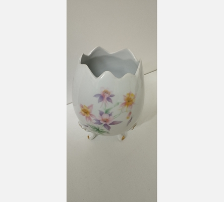 Vase uf Tripode en Porcelaine.
